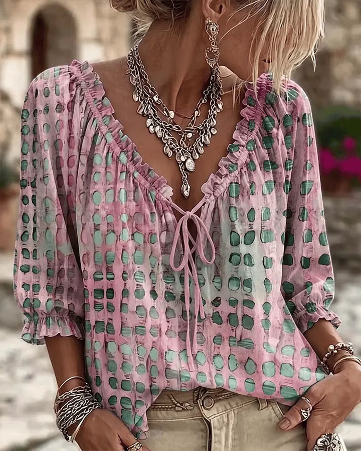 PIA | polka dot blouse with a V-neck