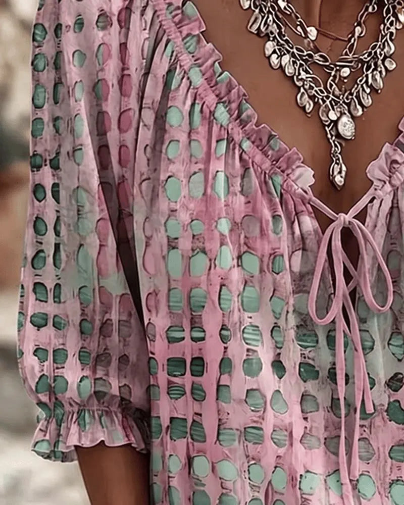 PIA | polka dot blouse with a V-neck