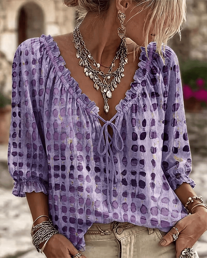 PIA | polka dot blouse with a V-neck